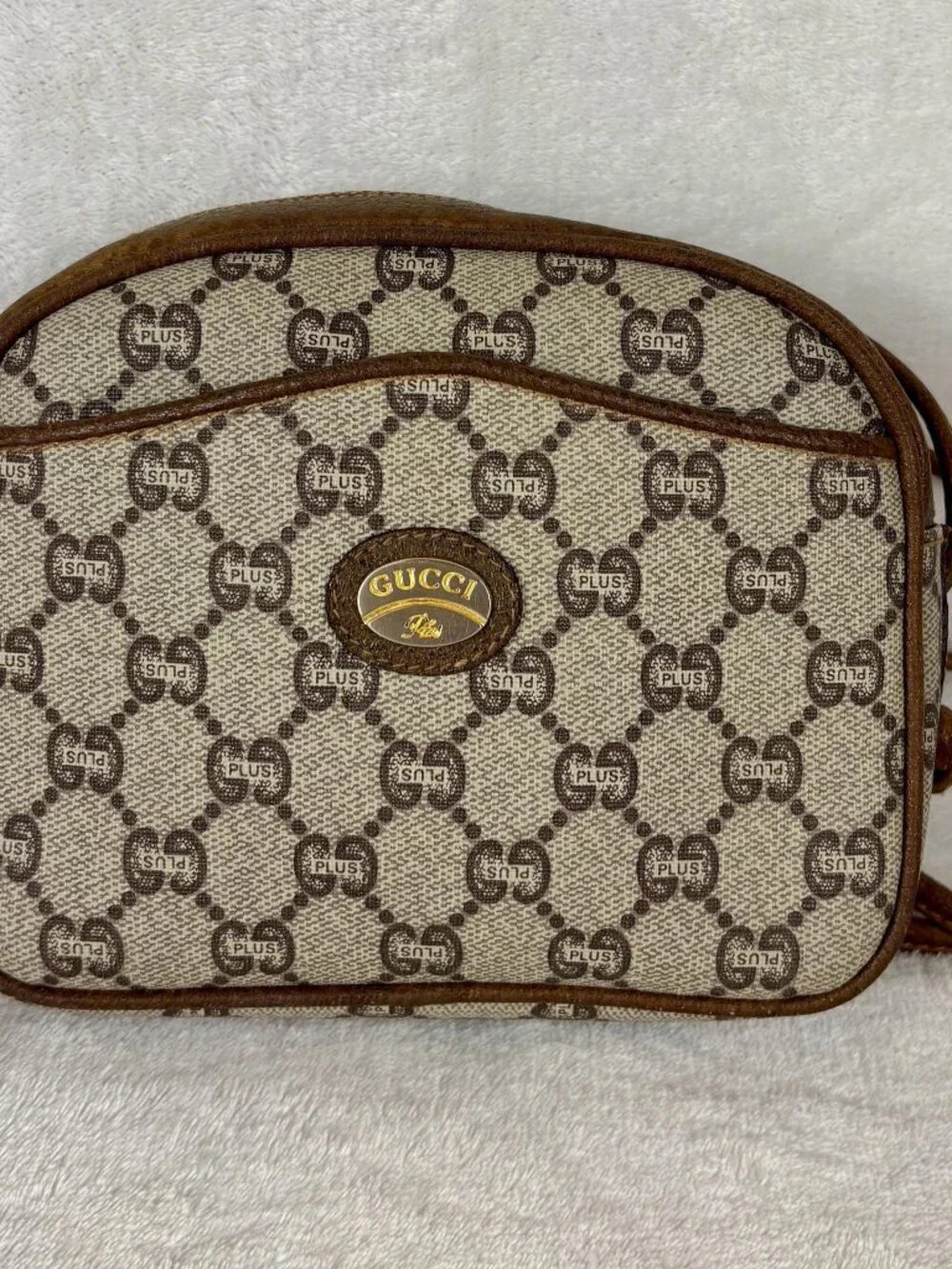 Gucci Plus GG Supreme Mini Crossbody in Monogram Coated Canvas and Leather Trim